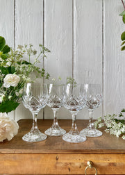 A set of 4 lead crystal vintage wine glasses